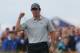 Rory McIlroy of Northern Ireland celebrates after playing an eagle on the 16th hole during the third day of the British Open Golf championship at the Royal Liverpool golf club, Hoylake, England, Saturday July 19, 2014. (AP Photo/Jon Super)