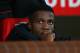 MANCHESTER, ENGLAND - JANUARY 05: Wilfried Zaha of Manchester United looks on from the bench prior to the FA Cup with Budweiser Third round match between Manchester United and Swansea City at Old Trafford on January 5, 2014 in Manchester, England. (Photo by Alex Livesey/Getty Images)