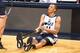 SALT LAKE CITY, UT - JULY 8: Dante Exum #11 of the Utah Jazz stretches during an open scrimmage at Energy Solutions Arena on July 8, 2014 in Salt Lake City, Utah. NOTE TO USER: User expressly acknowledges and agrees that, by downloading and or using this Photograph, User is consenting to the terms and conditions of the Getty Images License Agreement. Mandatory Copyright Notice: Copyright 2014 NBAE (Photo by Melissa Majchrzak/NBAE via Getty Images)