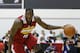 The Cleveland Cavaliers' Anthony Bennett drives toward the basket against the Milwaukee Bucks in an NBA summer league basketball game Friday, July 11, 2014, in Las Vegas. (AP Photo/John Locher)