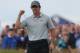 Rory McIlroy of Northern Ireland celebrates after playing an eagle on the 16th hole during the third day of the British Open Golf championship at the Royal Liverpool golf club, Hoylake, England, Saturday July 19, 2014. (AP Photo/Jon Super)