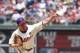 Philadelphia Phillies starting pitcher Cliff Lee pitches during the third inning of a baseball game against the Cincinnati Reds, Sunday, May 18, 2014, in Philadelphia. The Phillies won 8-3. (AP Photo/Chris Szagola)