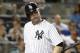 New York Yankees catcher Brian McCann (34) reacts after striking out in a baseball game against the Tampa Bay Rays at Yankee Stadium in New York, Monday, June 30, 2014. (AP Photo/Kathy Willens)