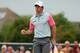 HOYLAKE, ENGLAND - JULY 20: Rory McIlroy of Northern Ireland celebrates a birdie putt on the first green during the final round of The 143rd Open Championship at Royal Liverpool on July 20, 2014 in Hoylake, England. (Photo by Mike Ehrmann/Getty Images)