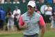 Rory McIlroy of Northern Ireland celebrates winning the British Open Golf championship after the final round at the Royal Liverpool golf club, Hoylake, England, Sunday July 20, 2014. (AP Photo/Scott Heppell)