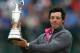 Rory McIlroy of Northern Ireland holds up the Claret Jug trophy after winning the British Open Golf championship at the Royal Liverpool golf club, Hoylake, England, Sunday July 20, 2014. (AP Photo/Scott Heppell)