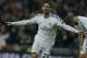 Real's Isco celebrates scoring his side's first goal during a Champions League quarterfinal first leg soccer match between Real Madrid and Borussia Dortmund at the Santiago Bernabeu stadium in Madrid, Spain, Wednesday April 2, 2014. (AP Photo/Paul White)