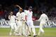 LONDON, ENGLAND - JULY 20: England batsman Alastair Cook leaves the crease after being dismissed as the India fielders celebrate during day four of 2nd Investec Test match between England and India at Lord's Cricket Ground on July 20, 2014 in London, United Kingdom. (Photo by Stu Forster/Getty Images)