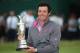 HOYLAKE, ENGLAND - JULY 20: Rory McIlroy of Northern Ireland holds the Claret Jug after his two-stroke victory at The 143rd Open Championship at Royal Liverpool on July 20, 2014 in Hoylake, England. (Photo by Andrew Redington/Getty Images)