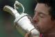 Rory McIlroy of Northern Ireland kisses the Claret Jug trophy after winning the British Open Golf championship at the Royal Liverpool golf club, Hoylake, England, Sunday July 20, 2014. (AP Photo/Peter Morrison)