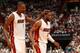 MIAMI, FL - April 20: Chris Bosh #1 and Dwyane Wade #3 of the Miami Heat celebrate against the Charlotte Bobcats during Game One of the Eastern Conference Quarterfinals of the 2014 NBA playoffs at the American Airlines Arena in Miami, Florida on April 20, 2014. NOTE TO USER: User expressly acknowledges and agrees that, by downloading and/or using this photograph, user is consenting to the terms and conditions of the Getty Images License Agreement. Mandatory copyright notice: Copyright NBAE 2014 (Photo by Issac Baldizon/NBAE via Getty Images)