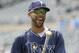 Tampa Bay Rays pitcher David Price laughs with a teammate after taking batting practice before a baseball game against the Minnesota Twins in Minneapolis, Sunday, July 20, 2014. (AP Photo/Ann Heisenfelt)