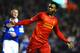 LIVERPOOL, ENGLAND - JANUARY 28: Daniel Sturridge of Liverpool celebrates after scoring his team's second goal during the Barclays Premier League match between Liverpool and Everton at Anfield on January 28, 2014 in Liverpool, England. (Photo by Laurence Griffiths/Getty Images)