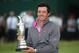 HOYLAKE, ENGLAND - JULY 20: Rory McIlroy of Northern Ireland holds the Claret Jug after his two-stroke victory at The 143rd Open Championship at Royal Liverpool on July 20, 2014 in Hoylake, England. (Photo by Andrew Redington/Getty Images)
