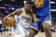 Apr 16, 2014; Denver, CO, USA; Denver Nuggets guard Aaron Brooks (0) drives to the basket during the second quarter against the Golden State Warriors at Pepsi Center. Mandatory Credit: Chris Humphreys-USA TODAY Sports