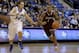 Fordham's Mandell Thomas, right, heads to the basket past Saint Louis' Jake Barnett during the first half of an NCAA college basketball game Saturday, Jan. 18, 2014, in St. Louis. (AP Photo/Jeff Roberson)