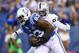 INDIANAPOLIS, IN - SEPTEMBER 08: Dwayne Allen #83 of the Indianapolis Colts runs for a touchdown while defended by Kevin Burnett #94 of the Oakland Raiders during the Colts 21-17 win at Lucas Oil Stadium on September 8, 2013 in Indianapolis, Indiana. (Photo by Andy Lyons/Getty Images)