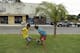 Boys play soccer on the street prior to the group A World Cup soccer match between Brazil and Mexico at the Arena Castelao in Fortaleza, Brazil, Tuesday, June 17, 2014. (AP Photo/Themba Hadebe)