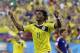 Colombia's Juan Cuadrado celebrates after scoring the opening goal from the penalty spot during the group C World Cup soccer match between Japan and Colombia at the Arena Pantanal in Cuiaba, Brazil, Tuesday, June 24, 2014. (AP Photo/Kirsty Wigglesworth)