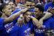 Sacramento Kings' Ray McCallum, center, celebrates after he was named the game MVP for the NBA summer league championship basketball game against the Houston Rockets Monday, July 21, 2014, in Las Vegas. McCallum scored 29 points and made nine rebounds in the game. (AP Photo/John Locher)