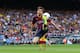 BARCELONA, SPAIN - MAY 17: Lionel Messi of FC Barcelona controls the ball during the La Liga match between FC Barcelona and Club Atletico de Madrid at Camp Nou on May 17, 2014 in Barcelona, Spain. (Photo by Alex Livesey/Getty Images)