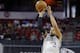 Sacramento Kings' Ray McCallum shoots a three point shot against the Houston Rockets during the NBA summer league championship basketball game Monday, July 21, 2014, in Las Vegas. (AP Photo/John Locher)