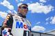 LONG POND, PA - JUNE 07: Tony Stewart, driver of the #14 Mobil 1/Bass Pro Shops Chevrolet, walks through the garage area during practice for the NASCAR Sprint Cup Series Pocono 400 at Pocono Raceway on June 7, 2014 in Long Pond, Pennsylvania. (Photo by Daniel Shirey/Getty Images)