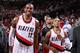 PORTLAND, OR - DECEMBER 21: Damian Lillard #0 and LaMarcus Aldridge #12 of the Portland Trail Blazers smile after the game against the New Orleans Pelicans on December 21, 2013 at the Moda Center Arena in Portland, Oregon. NOTE TO USER: User expressly acknowledges and agrees that, by downloading and or using this photograph, user is consenting to the terms and conditions of the Getty Images License Agreement. Mandatory Copyright Notice: Copyright 2013 NBAE (Photo by Sam Forencich/NBAE via Getty Images)