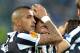 Juventus midfielder Claudio Marchisio, center, celebrates after scoring with teammate Arturo Vidal during the Europa League quarterfinal soccer match between Juventus and Olympic Lyon at the Juventus stadium, in Turin, Italy, Thursday, April 10, 2014. (AP Photo/ Massimo Pinca)