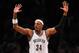 NEW YORK, NY - DECEMBER 18: Paul Pierce #34 of the Brooklyn Nets disputes a call in the second half against the Washington Wizards at Barclays Center on December 18, 2013 in the Brooklyn borough of New York City. The Wizards defeat the Nets 113-107. NOTE TO USER: User expressly acknowledges and agrees that, by downloading and/or using this photograph, user is consenting to the terms and conditions of the Getty Images License Agreement. (Photo by Maddie Meyer/Getty Images)