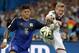 Argentina's Marcos Rojo, left, and Germany's Andre Schuerrle challenge for the ball during the World Cup final soccer match between Germany and Argentina at the Maracana Stadium in Rio de Janeiro, Brazil, Sunday, July 13, 2014. (AP Photo/Frank Augstein)