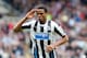 Newcastle United's Loic Remy celebrates his goal during their English Premier League soccer match against Cardiff City at St James' Park, Newcastle, England, Saturday, May 3, 2014. (AP Photo/Scott Heppell)