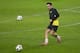 Barcelona's Xavi Hernandez trains with teammates at Manchester City's Etihad Stadium, Manchester, England, Monday Feb. 17, 2014. Barcelona will play Manchester City on Tuesday in a Champions League first knock out round soccer match. (AP Photo/Jon Super)