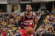 INDIANAPOLIS, IND - MAY 13: John Wall #2 of the Washington Wizards shoots a free throw against the Indiana Pacers in Game Five of the Eastern Conference Semi-Finals during the 2014 NBA Plaoffs at Bankers Life Fieldhouse on May 13, 2014 in Indianapolis, Indiana. NOTE TO USER: User expressly acknowledges and agrees that, by downloading and or using this Photograph, user is consenting to the terms and condition of the Getty Images License Agreement. Mandatory Copyright Notice: 2014 NBAE (Photo by Ron Hoskins/NBAE via Getty Images)