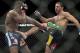 Rogerio Nogueira, of Rio de Janeiro, kicks Rashad Evans during their UFC 156 light heavyweight mixed martial arts match, Saturday, Feb. 2, 2013 at The Mandalay Bay Resort & Casino in Las Vegas. Nogueira won by unanimous decision. (AP Photo/Eric Jamison)