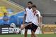 Germany's Mesut Ozil and Germany's Sami Khedira, from right, exercise with the ball during an official training session one day before the World Cup quarterfinal soccer match between Germany and France at the Maracana Stadium in Rio de Janeiro, Brazil, Thursday, July 3, 2014. (AP Photo/Martin Meissner)