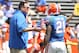 April 6, 2013; Gainesville FL, USA; Florida Gators running back coach Brain White talks with running back Kelvin Taylor (21) during the spring practice for the Orange and Blue Deput at Ben Hill Griffin Stadium. Mandatory Credit: Kim Klement-USA TODAY Sports