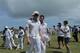 South African bowlers Morne Morkel, center left, and Dale Steyn cheer each others after defeating Sri Lanka by 153 runs during fifth day of the first test cricket match in Galle, Sri Lanka, Sunday, July 20, 2014. (AP Photo/Eranga Jayawardena)