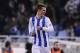Real Sociedad's Antoine Griezmann of France, smiles after scoring his goal against FC Barcelona, during the Spanish League soccer match, at Anoeta stadium in San Sebastian, Spain, Saturday, Feb. 22, 2014. (AP Photo/Alvaro Barrientos)