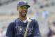 Tampa Bay Rays pitcher David Price laughs with a teammate after taking batting practice before a baseball game against the Minnesota Twins in Minneapolis, Sunday, July 20, 2014. (AP Photo/Ann Heisenfelt)