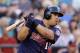 Minnesota Twins' Kendrys Morales connects on a grounder against the Seattle Mariners in the fourth inning of a baseball game Wednesday, July 9, 2014, in Seattle. He was safe at second on an error on the play, as two runs scored. (AP Photo/Elaine Thompson)