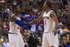 New York Knicks' Iman Shumpert, left, reacts with J.R. Smith, right, during the first half of an NBA basketball game against the Philadelphia 76ers, Saturday, Jan. 11, 2014, in Philadelphia. The Knicks win 102-92. (AP Photo/Chris Szagola)