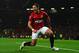 MANCHESTER, ENGLAND - NOVEMBER 24: Javier Hernandez of Manchester United celebrates scoring his team's third goal to make the score 3-1 during the Barclays Premier League match between Manchester United and Queens Park Rangers at Old Trafford on November 24, 2012 in Manchester, England. (Photo by Laurence Griffiths/Getty Images)