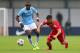 MANCHESTER, ENGLAND - OCTOBER 02: Seko Fofana of Manchester City battles with Riccardo Basta of FC Bayern Muenchen during the UEFA Youth Champions League match between Manchester City and FC Bayern Muenchen at Ewen Fields on October 2, 2013 in Manchester, England. (Photo by Julian Finney/Getty Images)