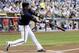 Milwaukee Brewers' Aramis Ramirez hits a home run during the first inning of a baseball game against the Cincinnati Reds, Tuesday, July 22, 2014, in Milwaukee. (AP Photo/Morry Gash)