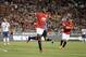 Manchester United's Danny Welbeck celebrates after scoring against the Los Angeles Galaxy during the first half of a friendly soccer match at Rose Bowl on Wednesday, July 23, 2014, in Pasadena, Calif. (AP Photo)