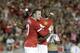 Manchester United's Wayne Rooney, left, celebrates with Danny Welbeck after scoring on a penalty kick during the first half of a friendly soccer match against the Los Angeles Galaxy at Rose Bowl on Wednesday, July 23, 2014, in Pasadena, Calif. (AP Photo)