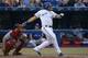 TORONTO, CANADA - JULY 22: Melky Cabrera #53 of the Toronto Blue Jays hits an RBI single in the third inning during MLB game action against the Boston Red Sox on July 22, 2014 at Rogers Centre in Toronto, Ontario, Canada. (Photo by Tom Szczerbowski/Getty Images)