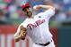 Philadelphia Phillies starting pitcher Cliff Lee throws a pitch during the first inning of a baseball game against the San Francisco Giants on Monday, July 21, 2014, in Philadelphia. (AP Photo/Michael Perez)