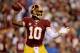 LANDOVER, MD - SEPTEMBER 09: Quarterback Robert Griffin III #10 of the Washington Redskins looks to pass in the first quarter agianst the Philadelphia Eagles at FedExField on September 9, 2013 in Landover, Maryland. (Photo by Patrick Smith/Getty Images)